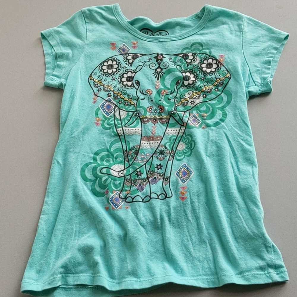 A blue t shirt with a elephant on the front